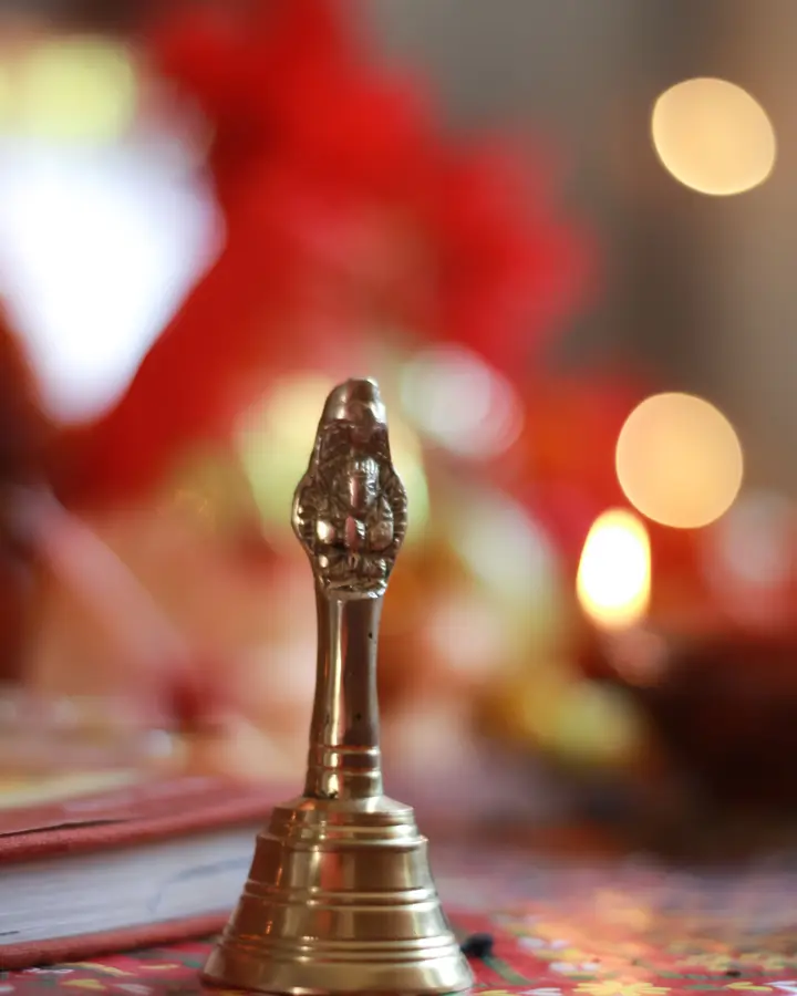 Pooja mani, hand bell