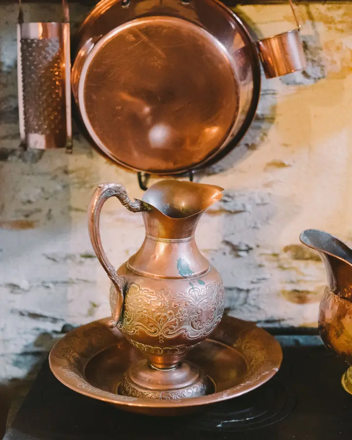 Engraved copper jug and basin
