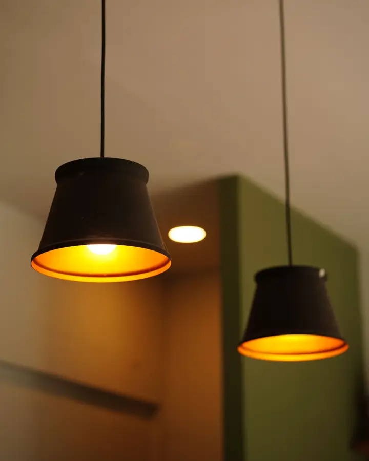 Tapered metal pendant