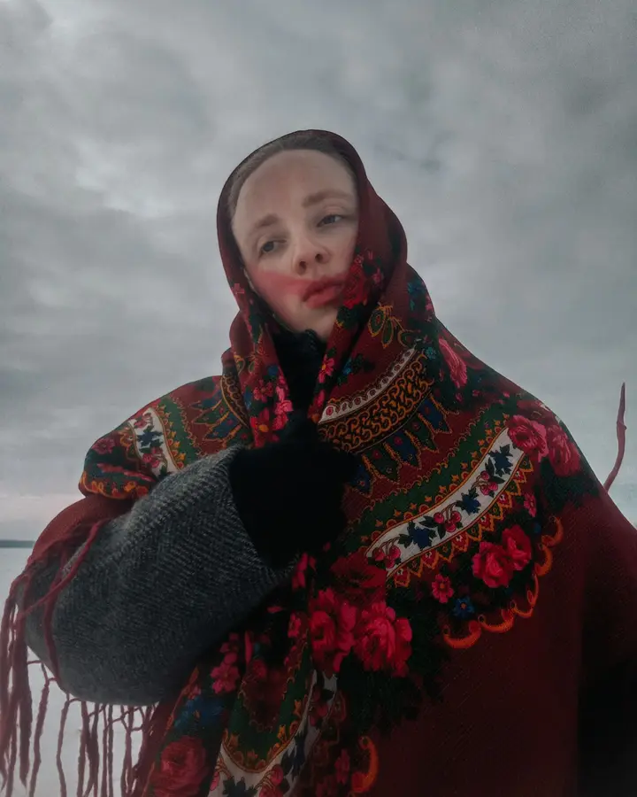 Aari-embroidered wool shawl
