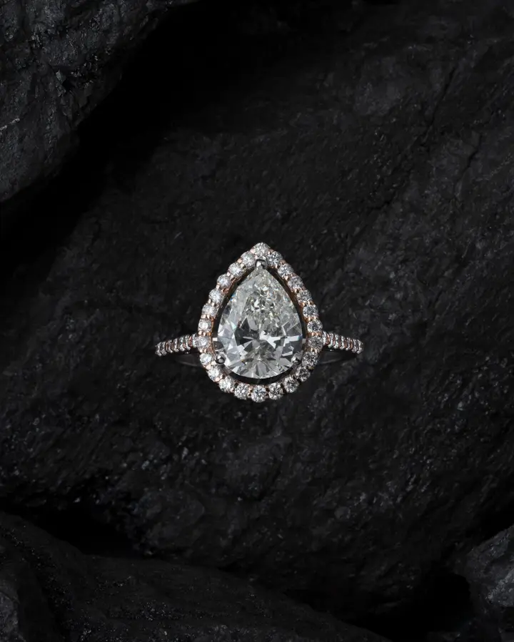 Pear halo engagement ring